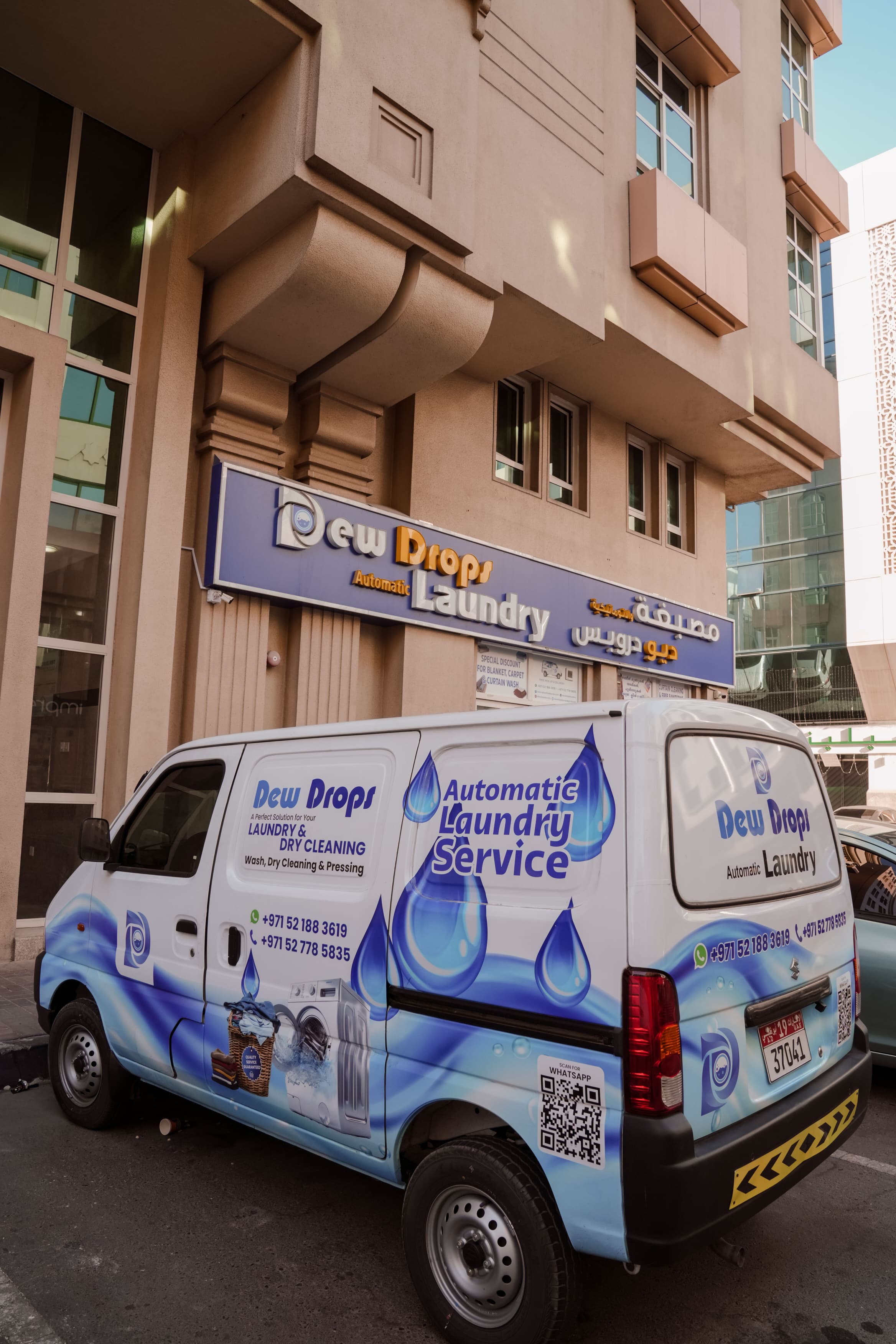 Pristine blue-themed laundry interior with modern machines
